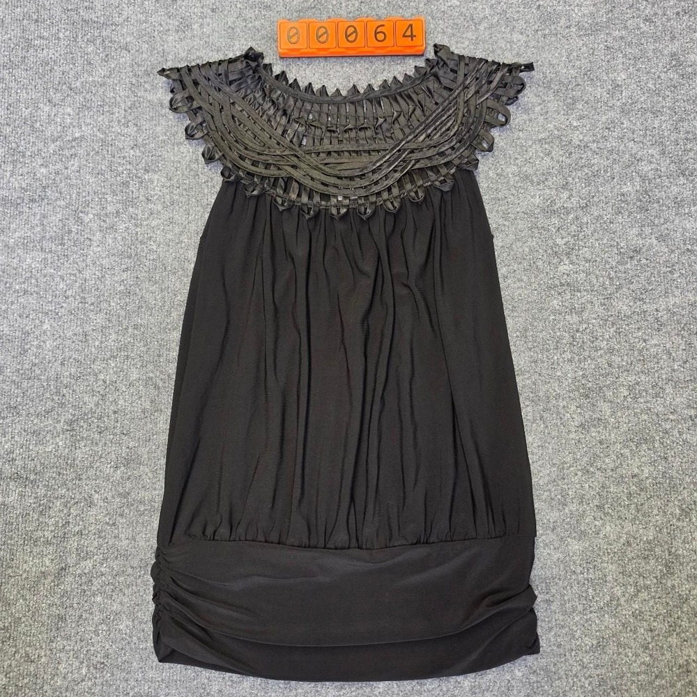 Black sleeveless blouse. Size Medium.